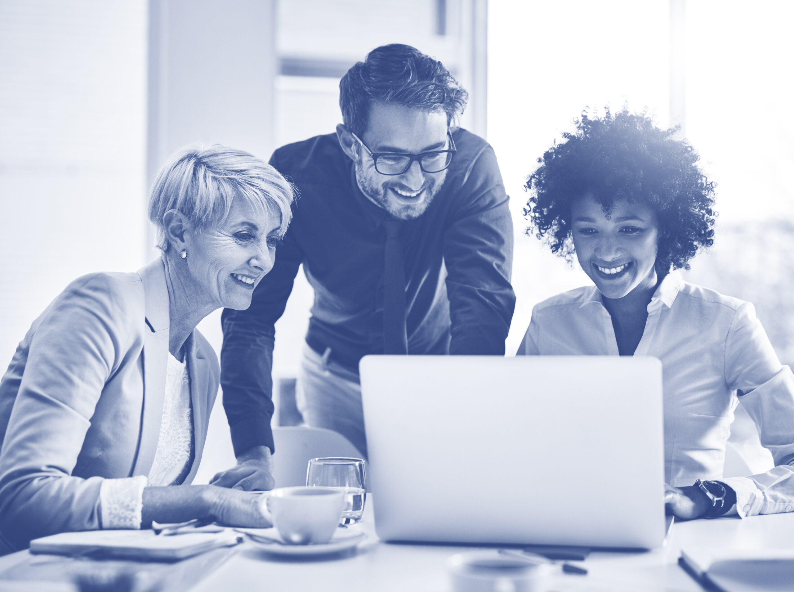Laptop, discussion and team in the office while working on a company project. Technology, teamwork and business people doing corporate research in collaboration together with technology in workplace