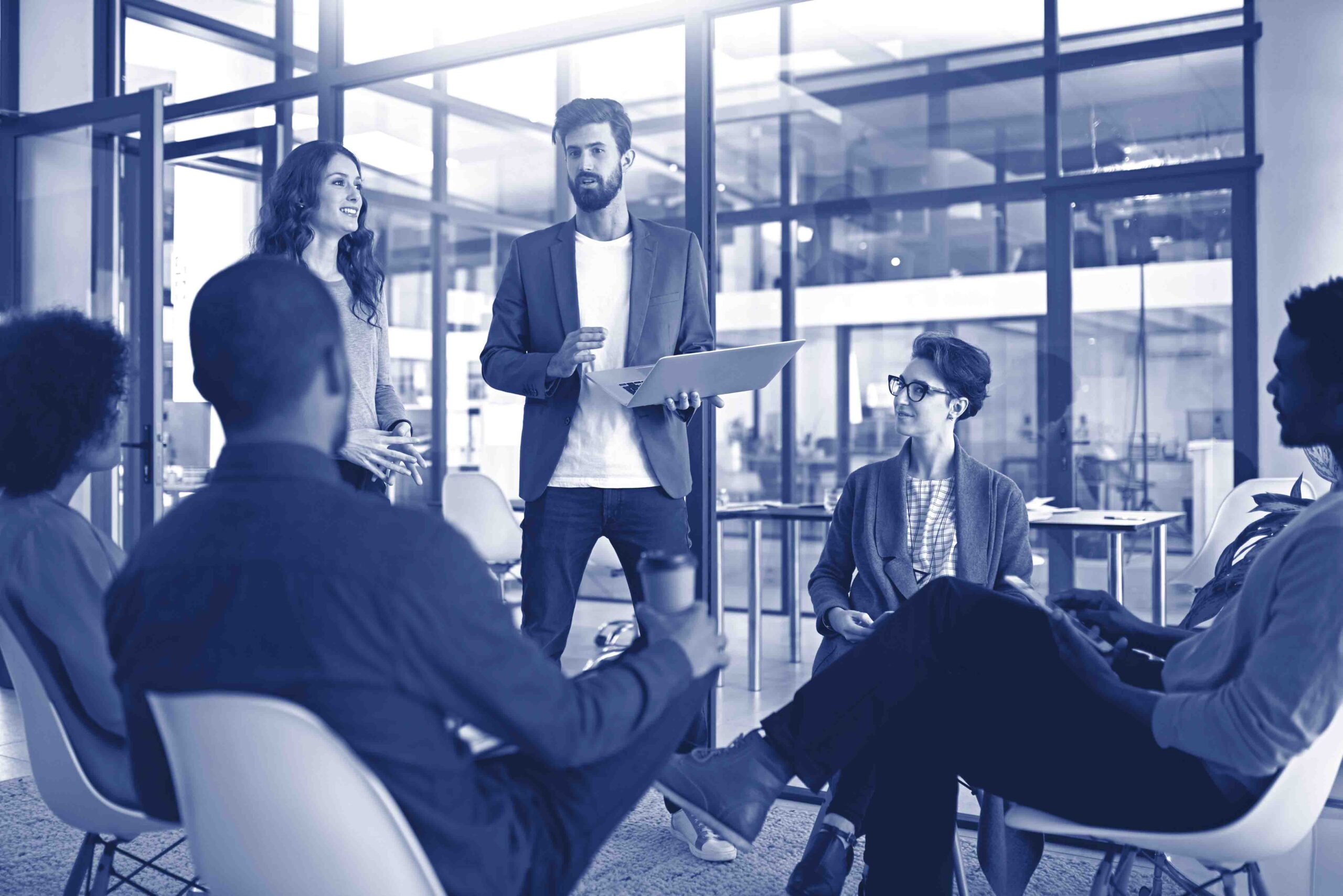 Working towards maximising their potential as a team. Cropped shot of a group of creatives having a meeting in a modern office.